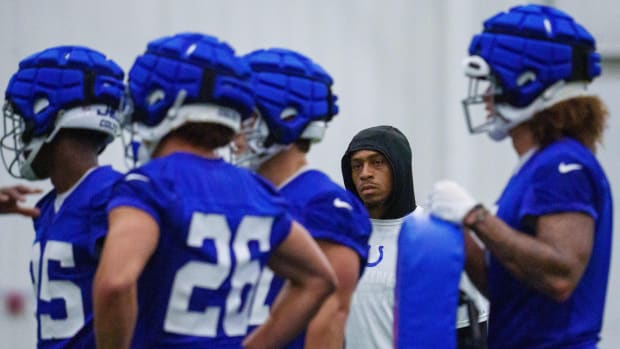 Colts running back Jonathan Taylor (28) makes his way around the field during an indoor practice.